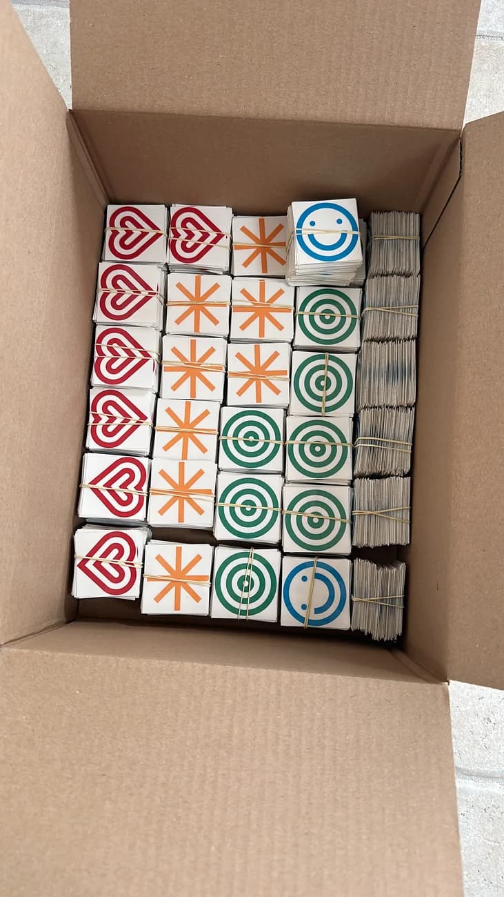 Boxed bulk run of folded temporary tattoo packs