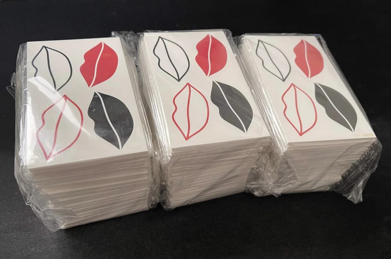 Stacks of lip-print temporary tattoo sheets