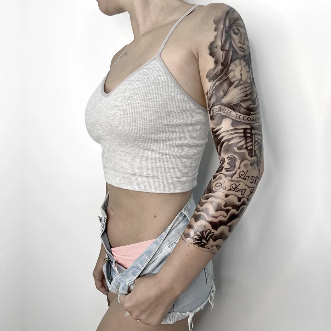 Black-and-grey realism full sleeve — shoulder to wrist