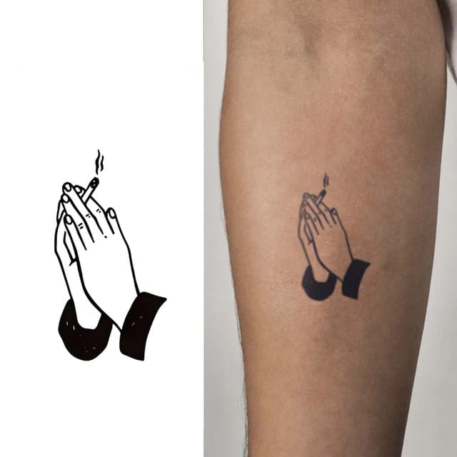 Praying hands cradling a cigarette — view 1