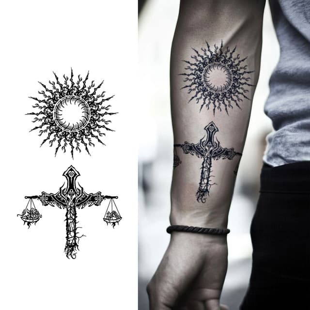 Sun and ornate cross — view 1