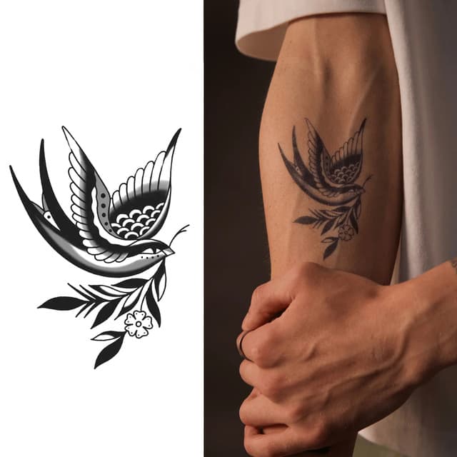 Traditional swallow with olive sprig — view 1